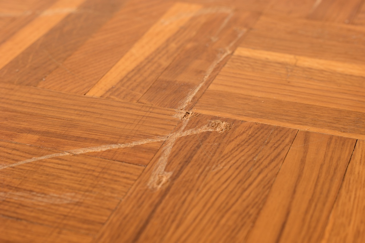 deep scratches on old wooden parquet. closeup - Adobe Stock | Kodec