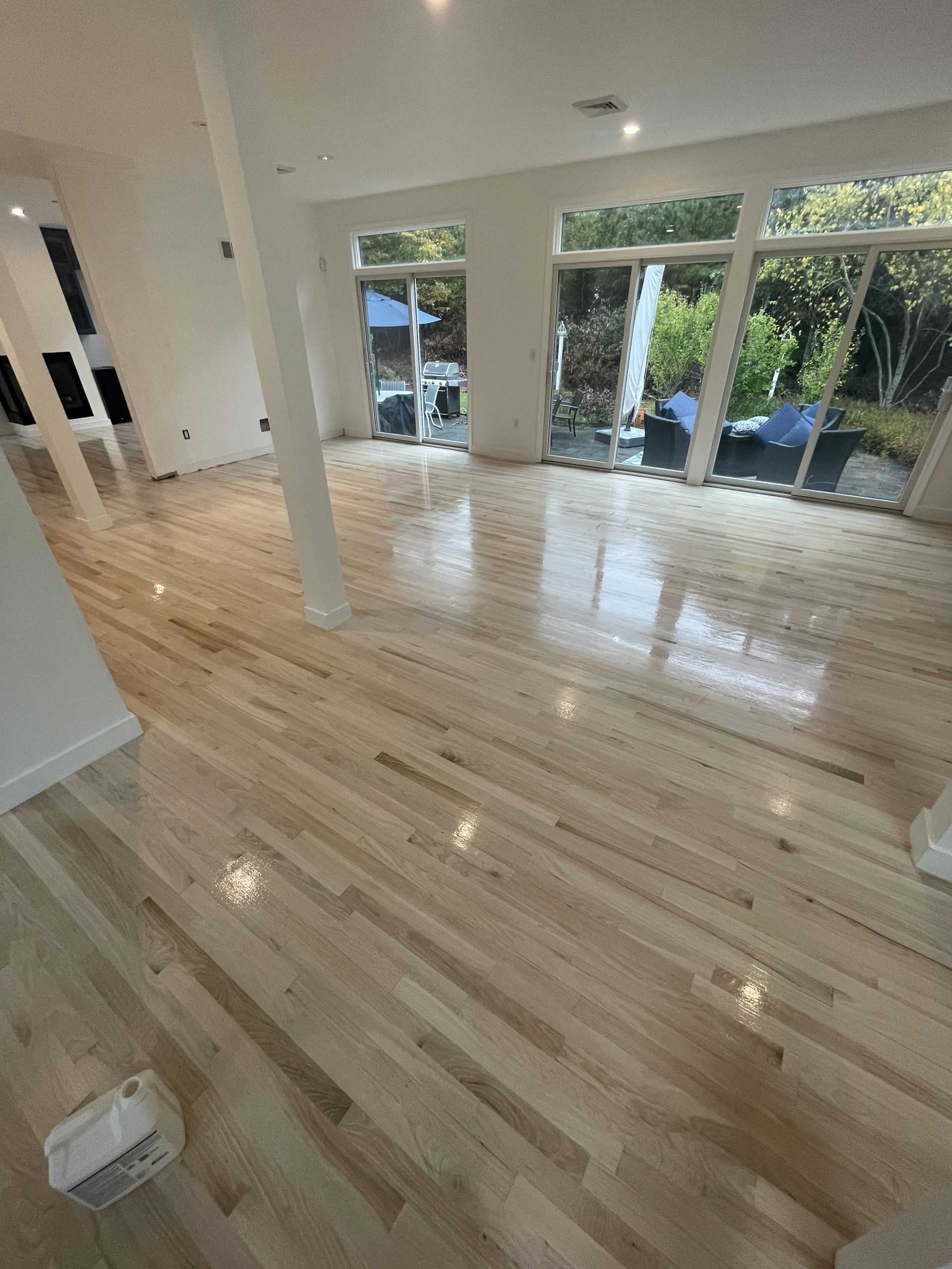 Modern light white oak wood floor protected with crystal clear water-based finish