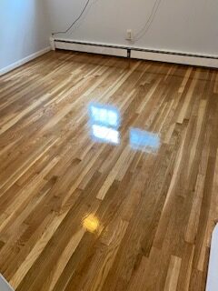 Refinished water damaged wood floors in Waltham, MA